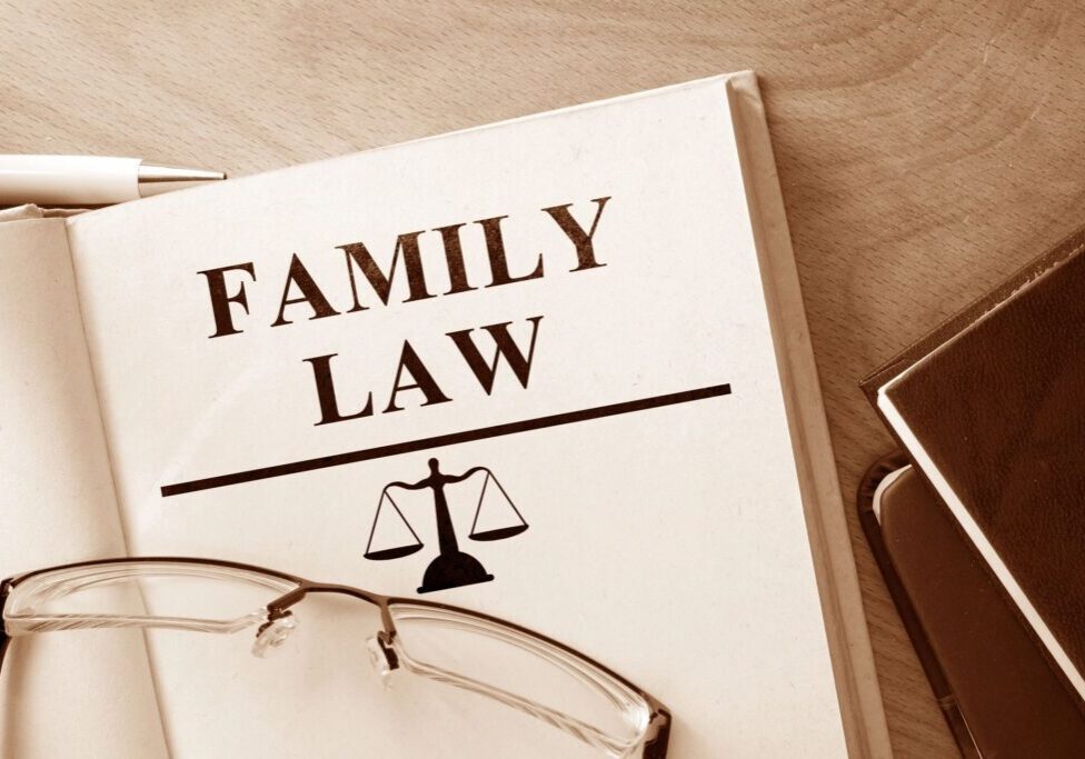 A family law book with glasses on top of it.