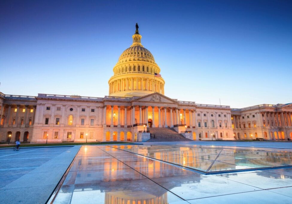 A building with the capitol in the background.